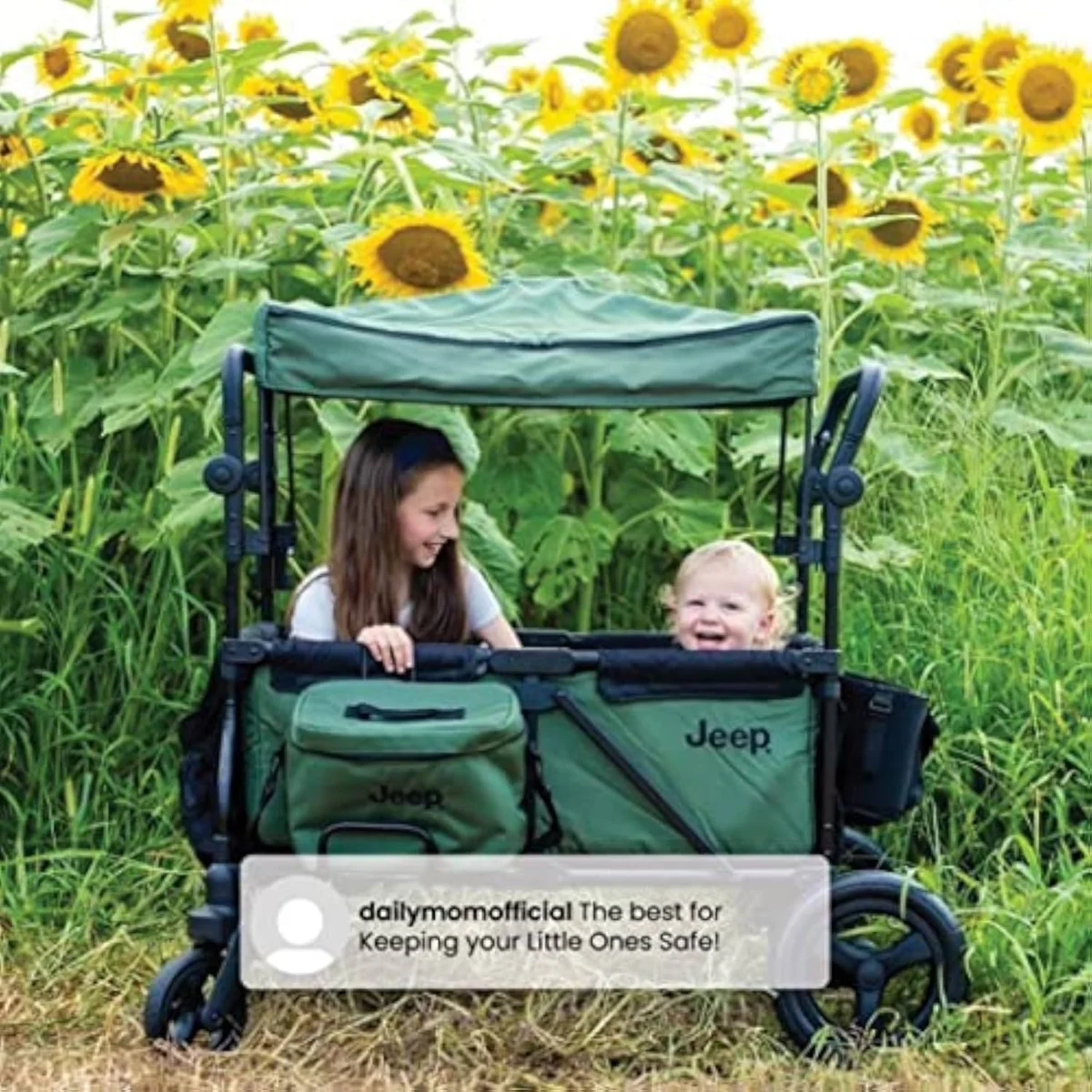 The Jeep Deluxe Wrangler wagon on grass showing its all-terrain airless tires and low handle