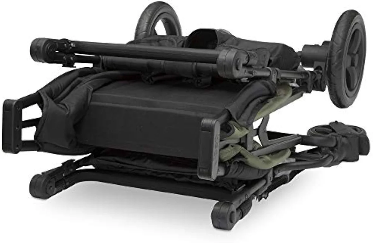 The Jeep Deluxe Wrangler wagon folded flat, both wheels resting on the ground