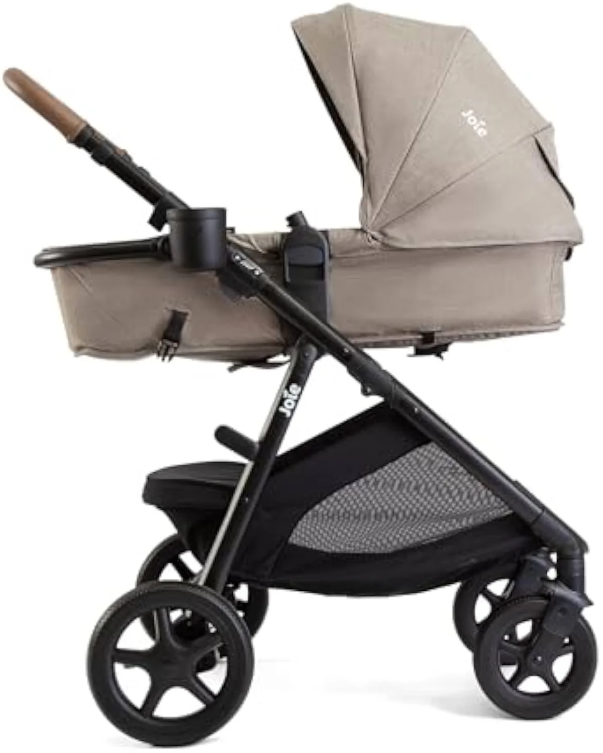 The Joie Ginger 4-in-1 convertible pramette stroller shown in toddler-seat mode