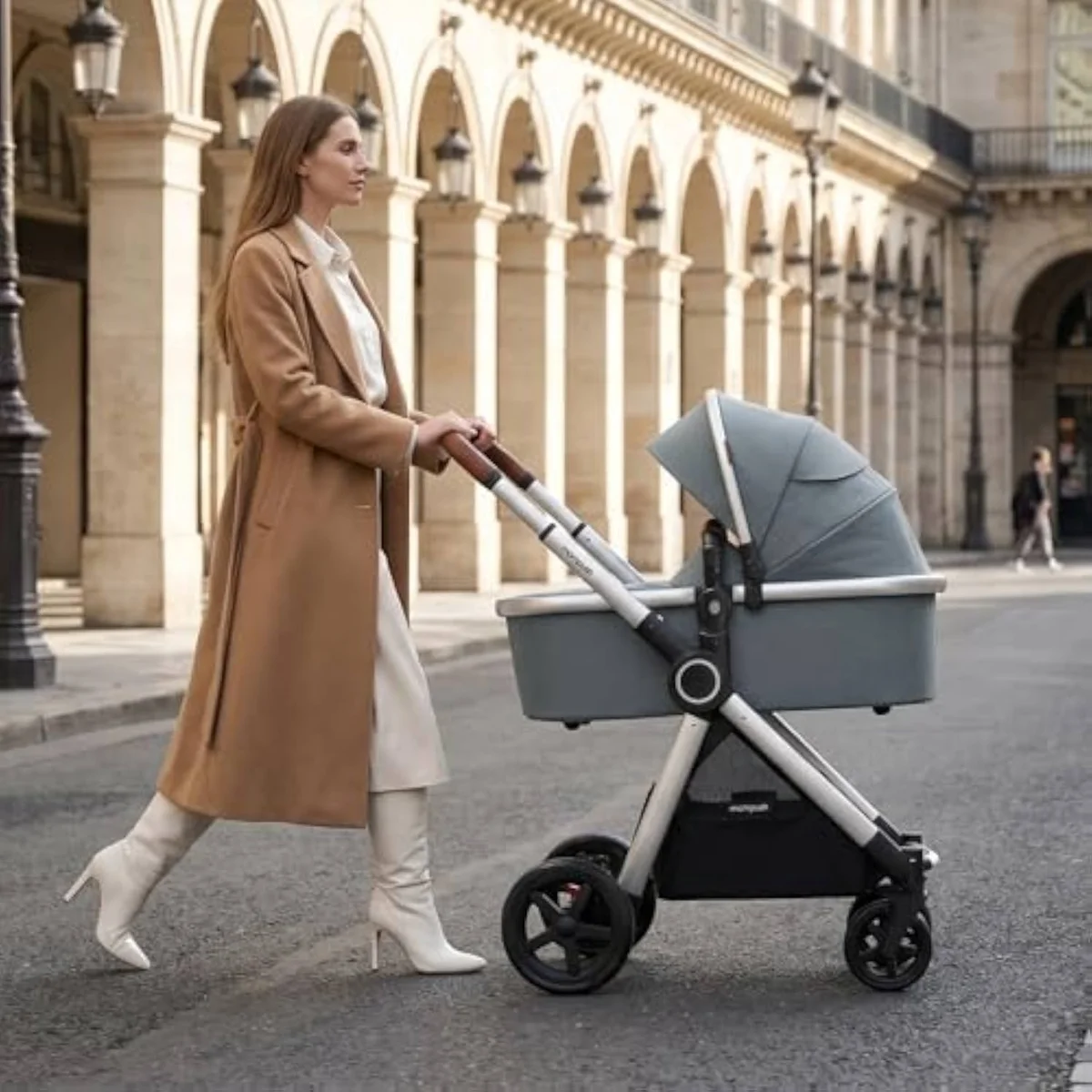 The Mompush Ultimate2 full-size travel system, which includes a Nuna car seat adapter
